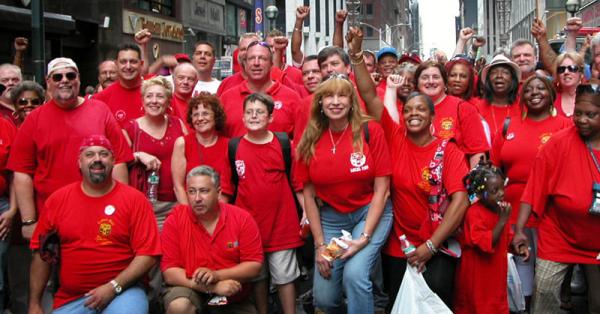 group of cwa members wearing red shirts