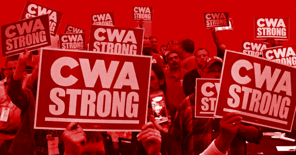 Members holding up CWA Strong signs.