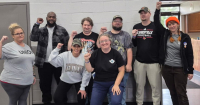 workers at the New Flyer parts warehouse in Louisville