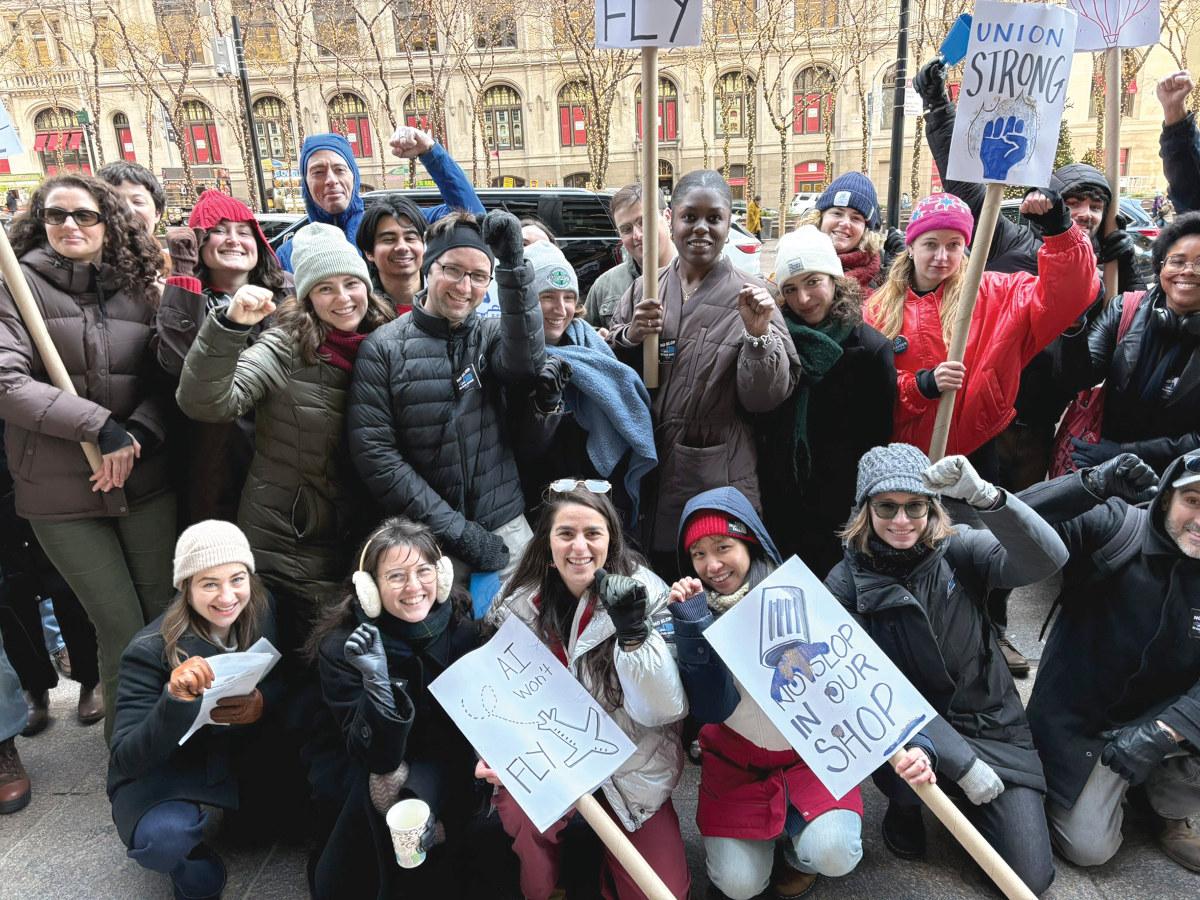 NewsGuild-CWA members rallied against AI Slop in December 2025.